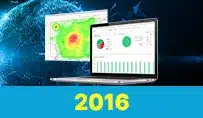 Tela de computador com gráficos e mapas de conectividade M2M, com o ano 2016 em destaque.